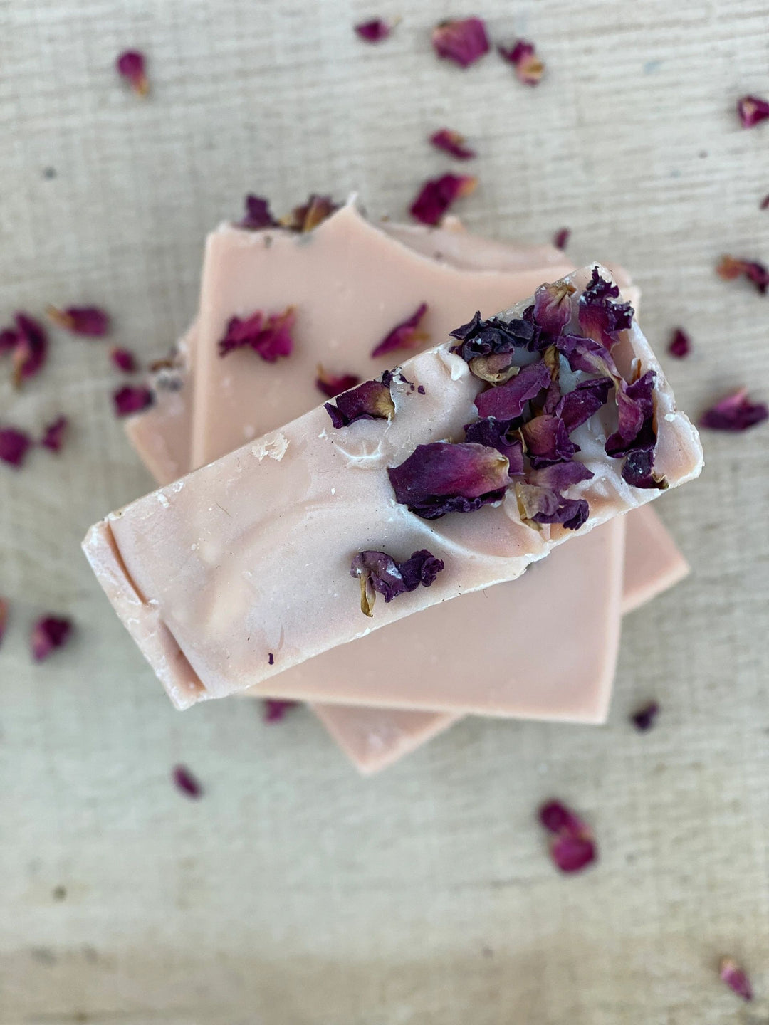 French Rose Clay, rose petals on a pink soap bar